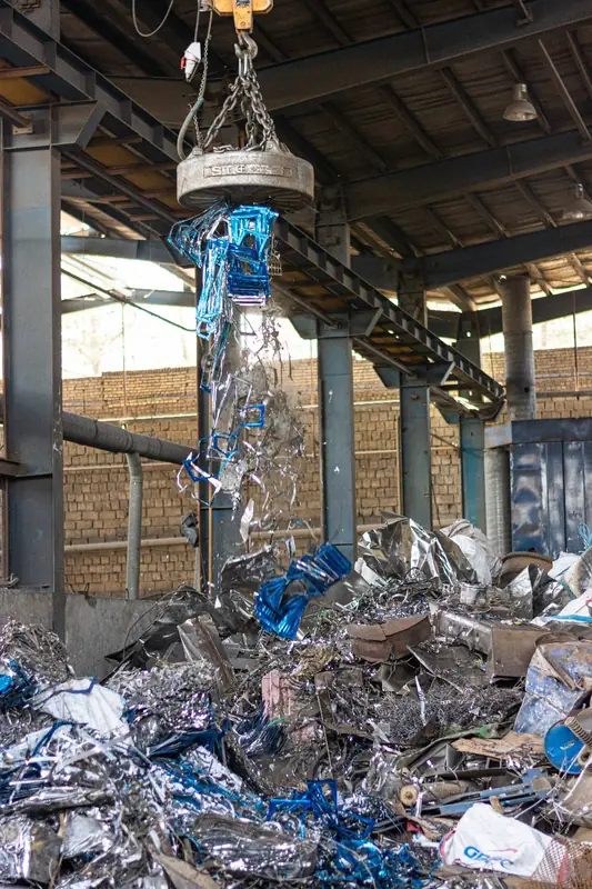 Scrap charging — magnet handling raw material