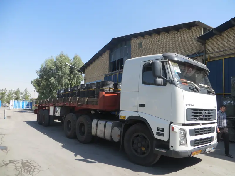 Loaded flatbed — export dispatch from the plant
